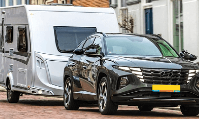 Hyundai Tucson met caravan